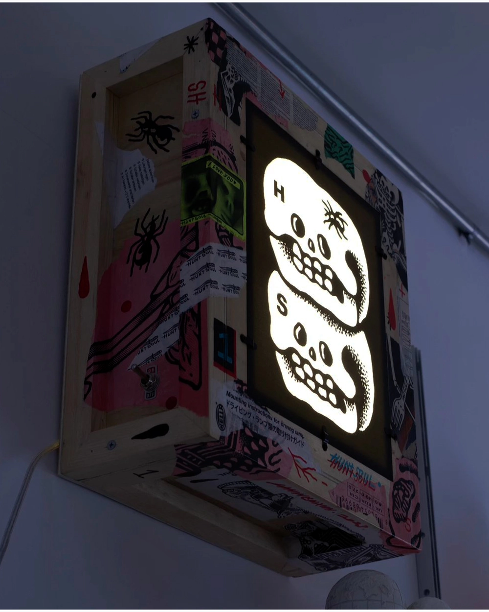 HUNTSOUL graffiti skull light box styled as wall art lighting - lifestyle setting