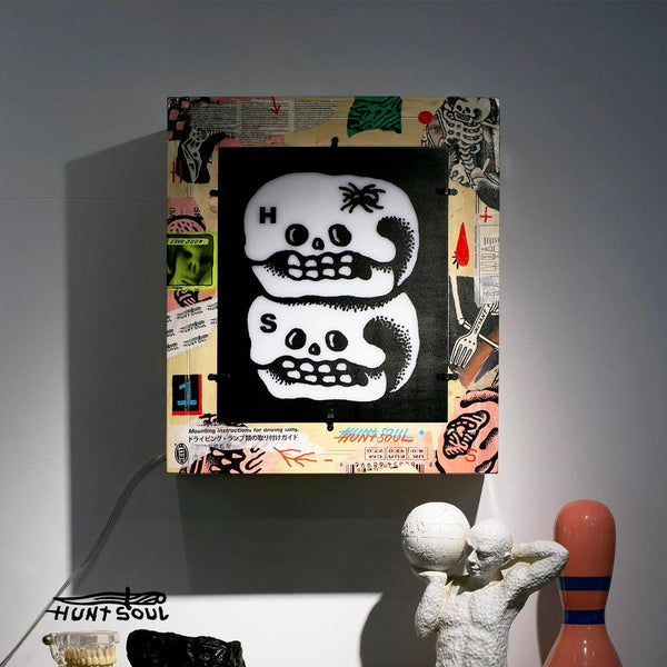 Huntsoul custom light box with printed black detail and lacquered wood frame