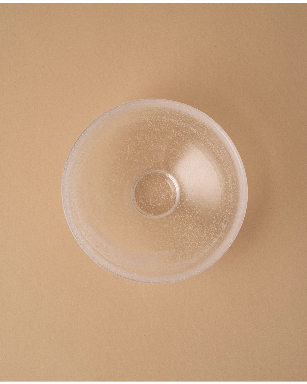 Top view of glass bowl with fine bubble texture
